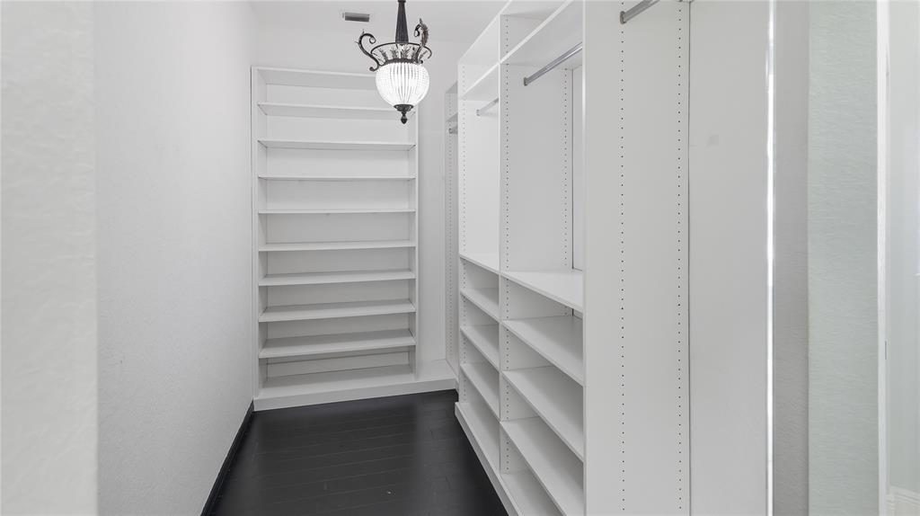 10141 Umberland Place Boca Raton, FL 33428 - Photo 15 of 28 a view of walk in closet with empty racks