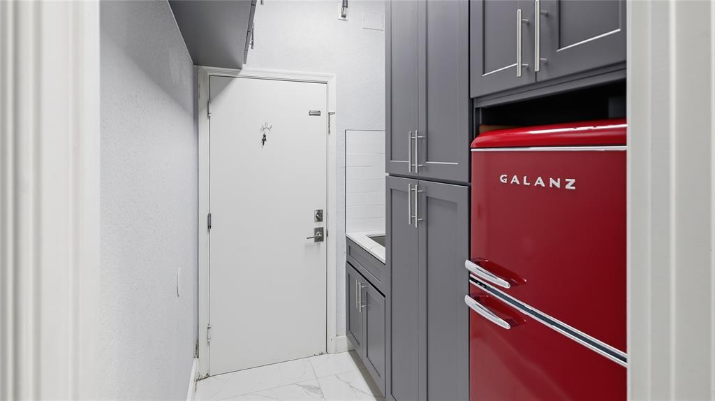 10141 Umberland Place Boca Raton, FL 33428 - Photo 26 of 28 a refrigerator freezer sitting inside of a kitchen