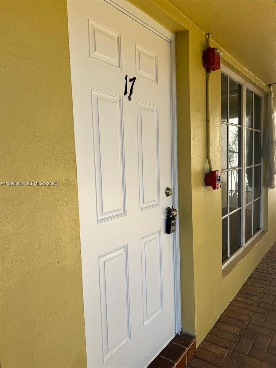 105 Northeast 12th Avenue, Unit 17 Hallandale Beach, FL 33009 - Photo 11 of 11 a bathroom with a shower