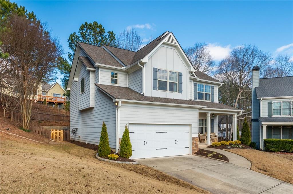 503 Pinnacle Court Canton, GA 30115 - Photo 2 of 51 a front view of a house with a yard