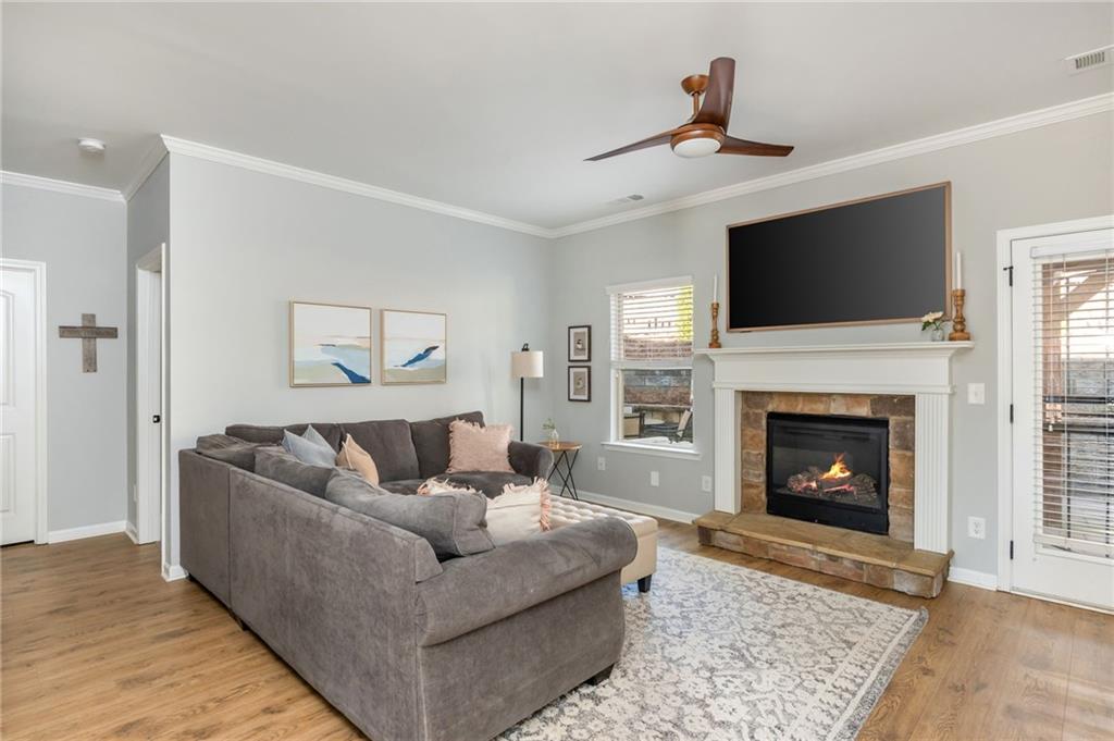 503 Pinnacle Court Canton, GA 30115 - Photo 23 of 51 a living room with furniture and a fireplace