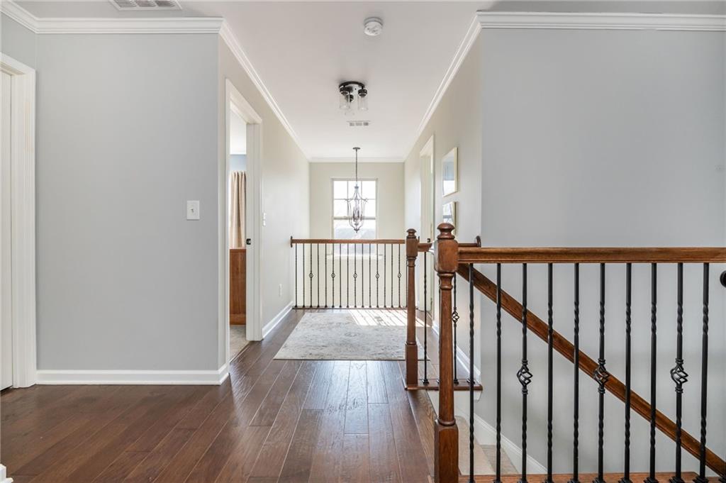 503 Pinnacle Court Canton, GA 30115 - Photo 29 of 51 a view of a hallway with wooden floor and windows