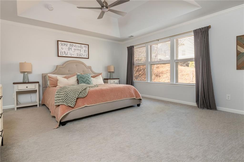 503 Pinnacle Court Canton, GA 30115 - Photo 30 of 51 a bedroom with a bed and a window