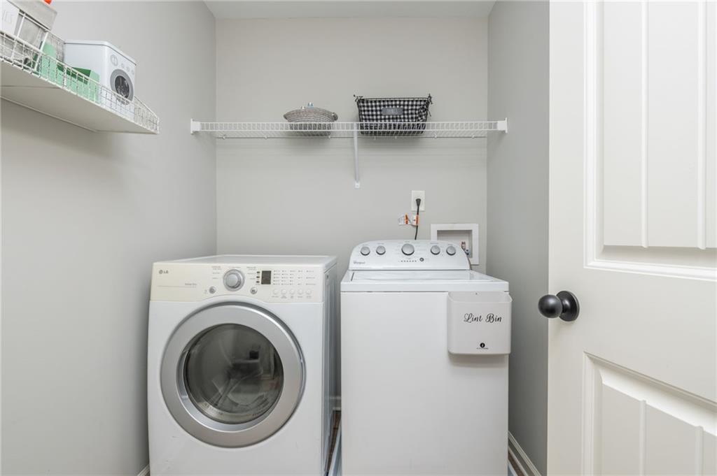 503 Pinnacle Court Canton, GA 30115 - Photo 43 of 51 a utility room with dryer and washer