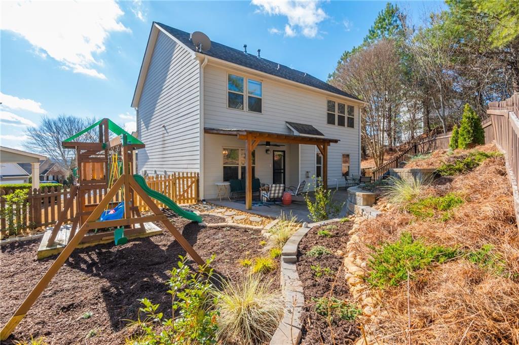 503 Pinnacle Court Canton, GA 30115 - Photo 45 of 51 a view of a house with a yard