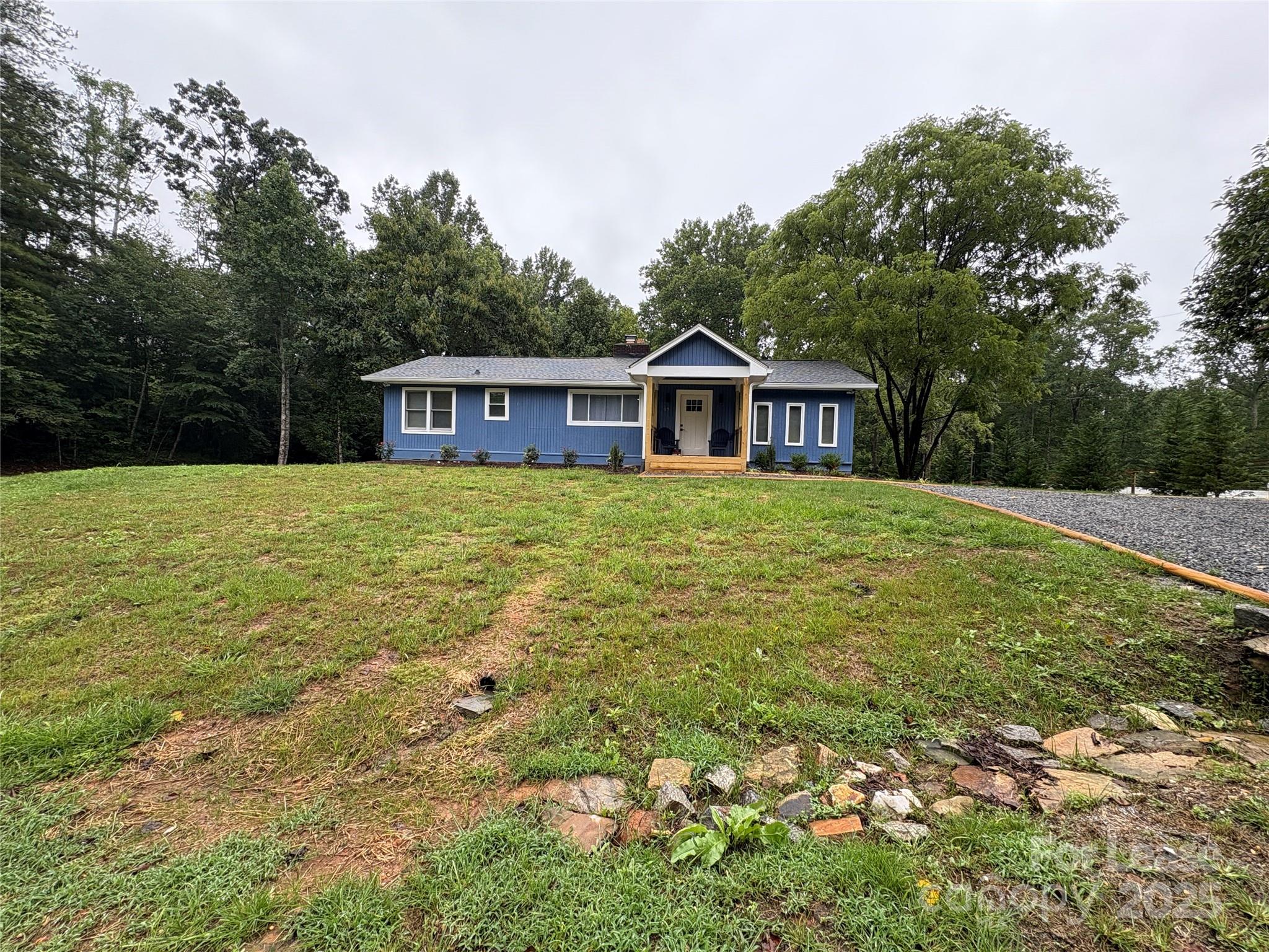 1175 Kilpatrick Road Hendersonville, NC 28739 - Photo 12 of 34 a front view of a house with yard