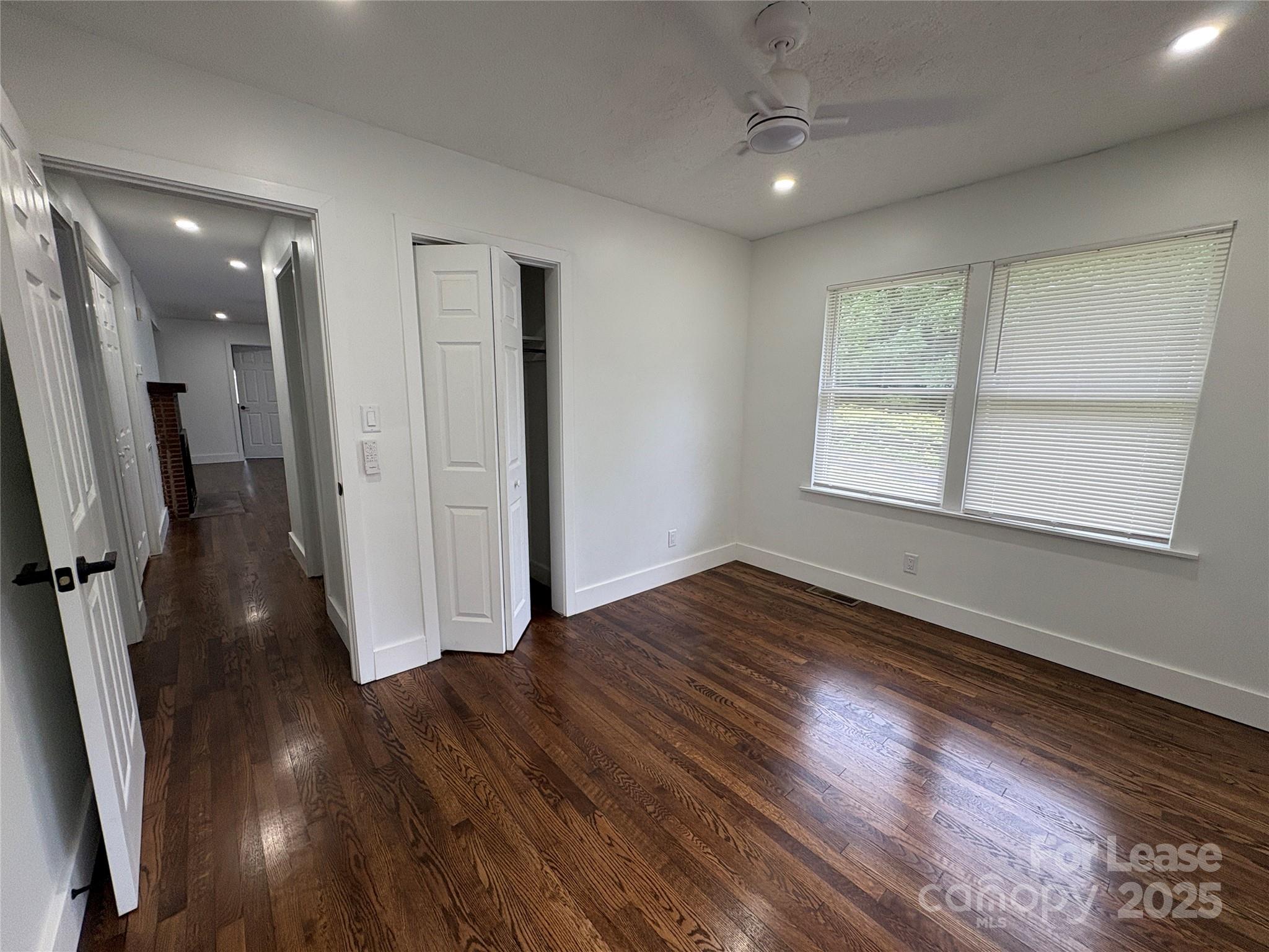 1175 Kilpatrick Road Hendersonville, NC 28739 - Photo 18 of 34 wooden floor in an empty room with a window