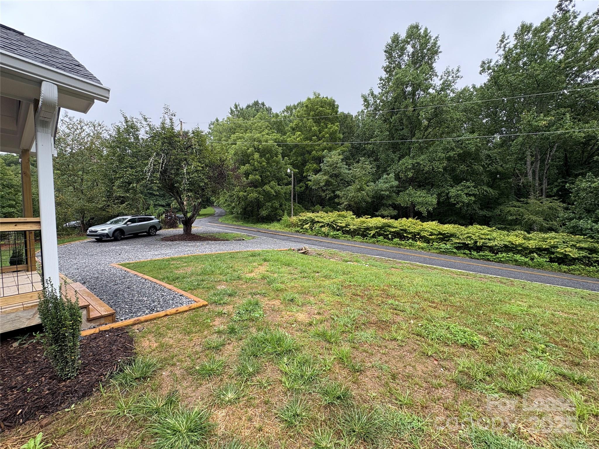 1175 Kilpatrick Road Hendersonville, NC 28739 - Photo 30 of 34 a view of yard with tree
