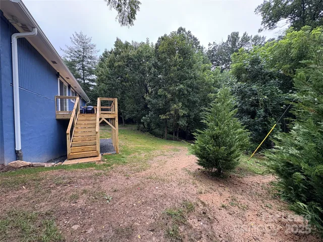 a view of a backyard with green space