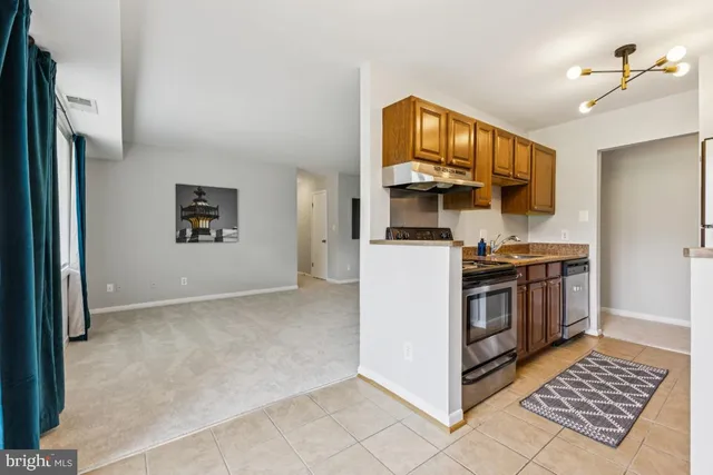 a bathroom with a sink a mirror and a toilet