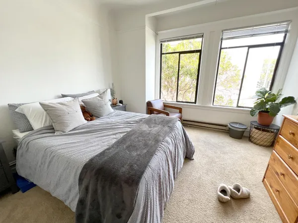 a view of entryway with furniture and a rug