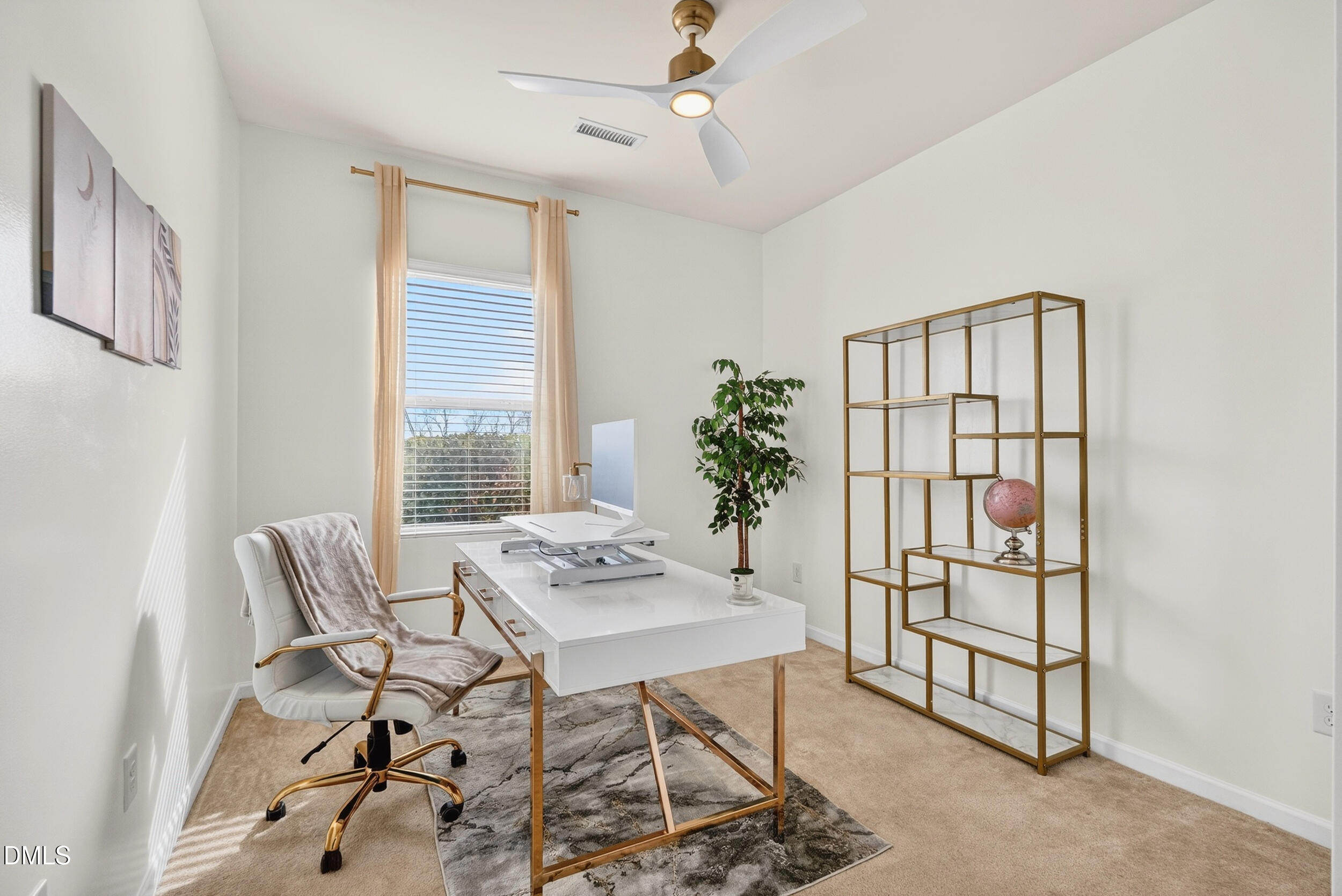 8144 Hovingham Way Raleigh, NC 27616 - Photo 12 of 37 a view of a livingroom with furniture and a window