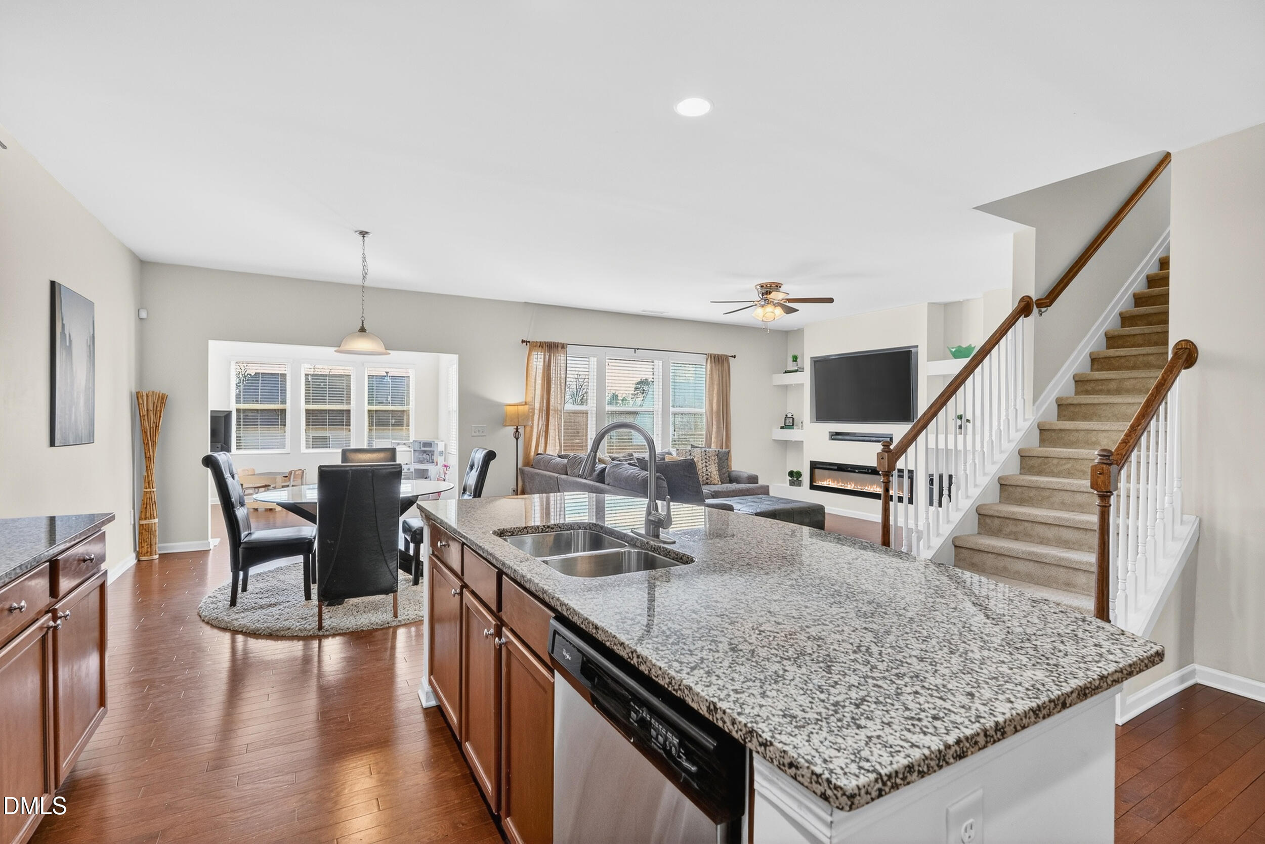 8144 Hovingham Way Raleigh, NC 27616 - Photo 6 of 37 a view of a kitchen with dining table and chairs