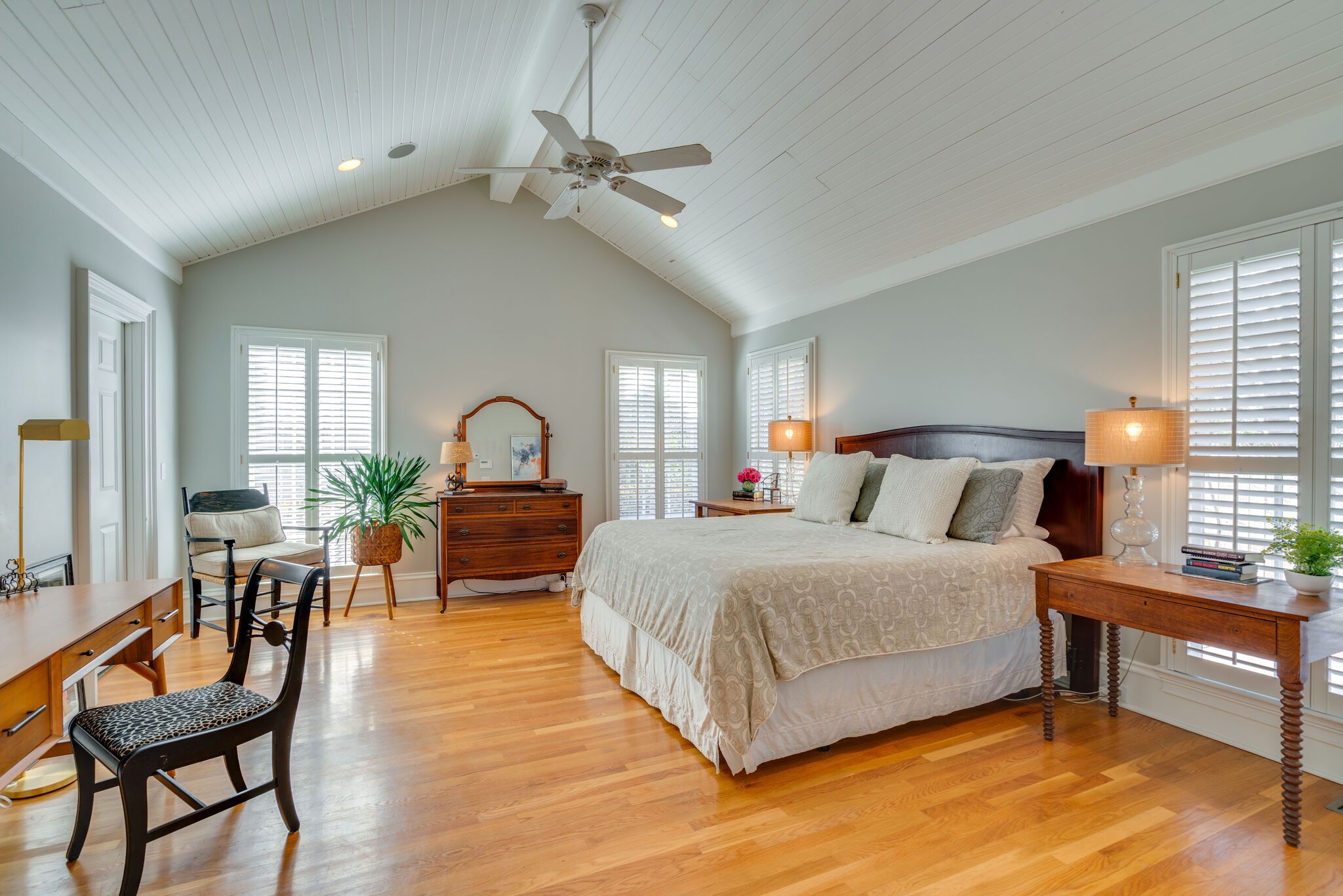 411 Page Road Nashville, TN 37205 - Photo 20 of 53 a bedroom with a bed and a dresser next to a window