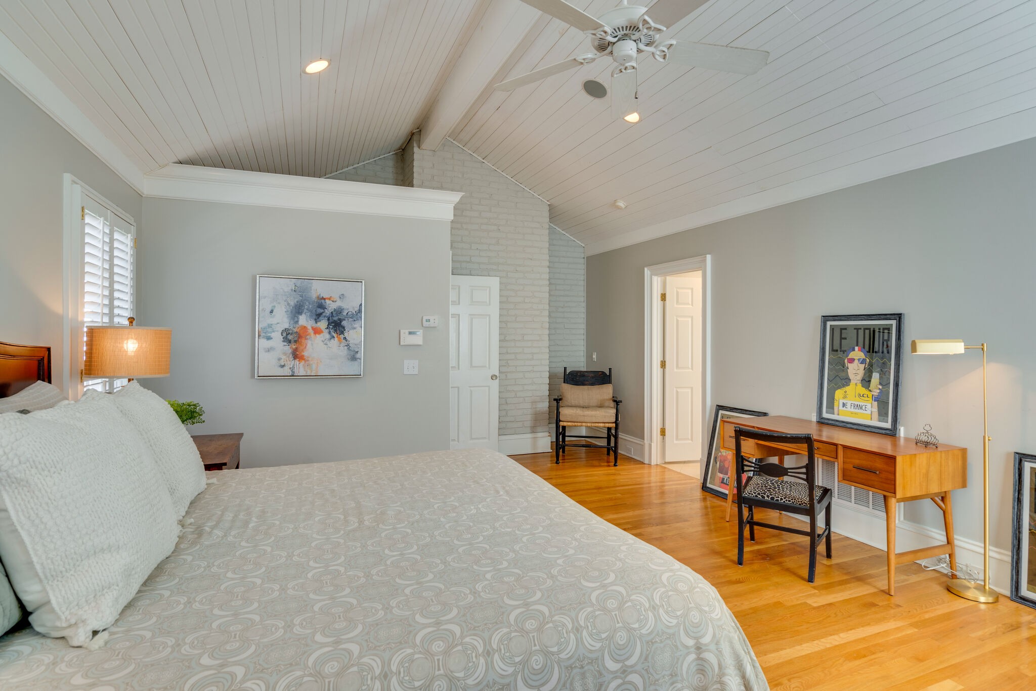 411 Page Road Nashville, TN 37205 - Photo 21 of 53 a bedroom with a bed and a chandelier