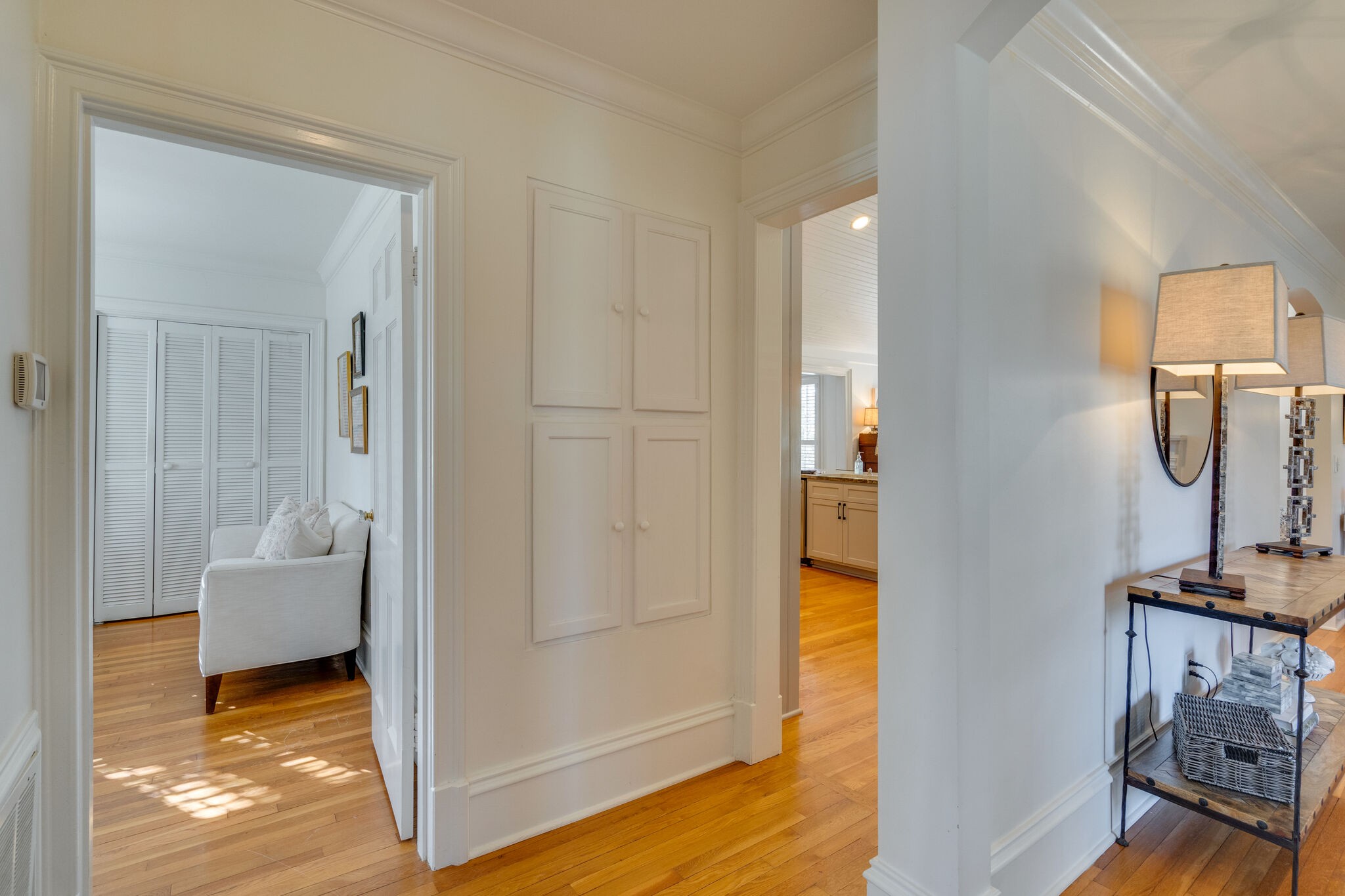 411 Page Road Nashville, TN 37205 - Photo 26 of 53 a view of a hallway with bathroom and wooden floor