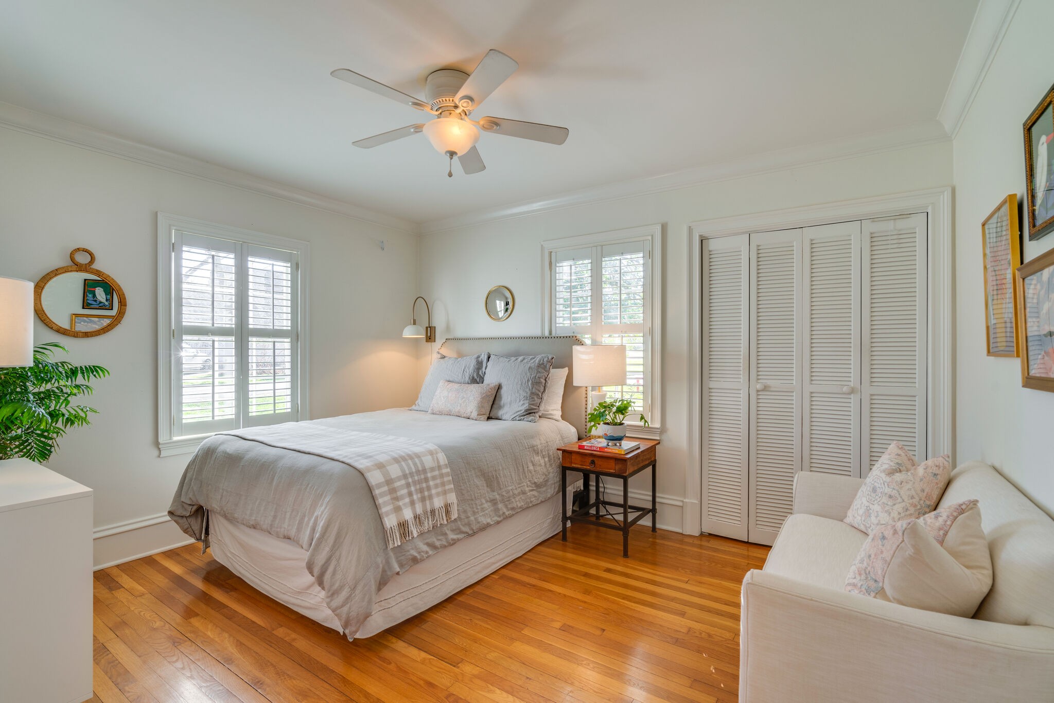 411 Page Road Nashville, TN 37205 - Photo 27 of 53 a bedroom with a bed and a chandelier