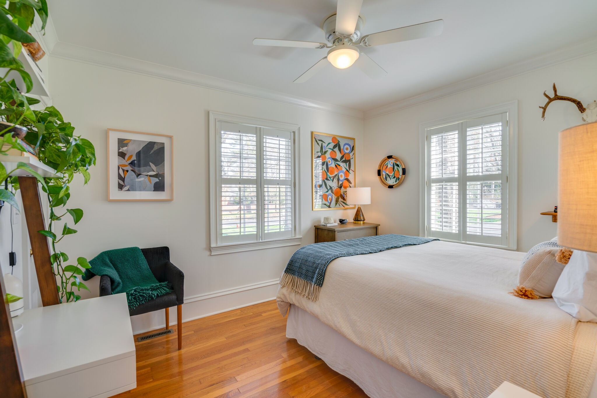 411 Page Road Nashville, TN 37205 - Photo 29 of 53 a bedroom with a bed a chandelier and a window