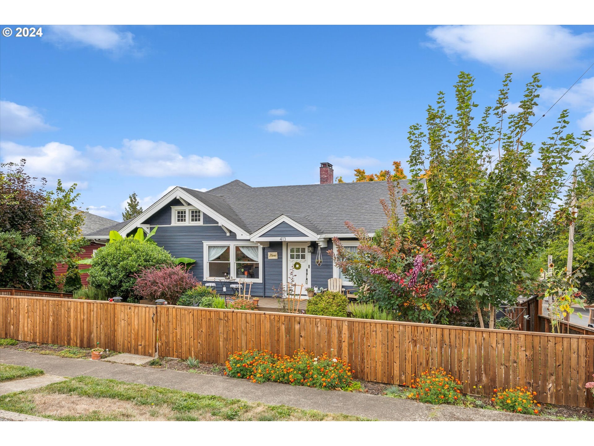 413 North 1st Avenue Ridgefield, WA 98642 - Photo 2 of 36 front view of a house with a yard