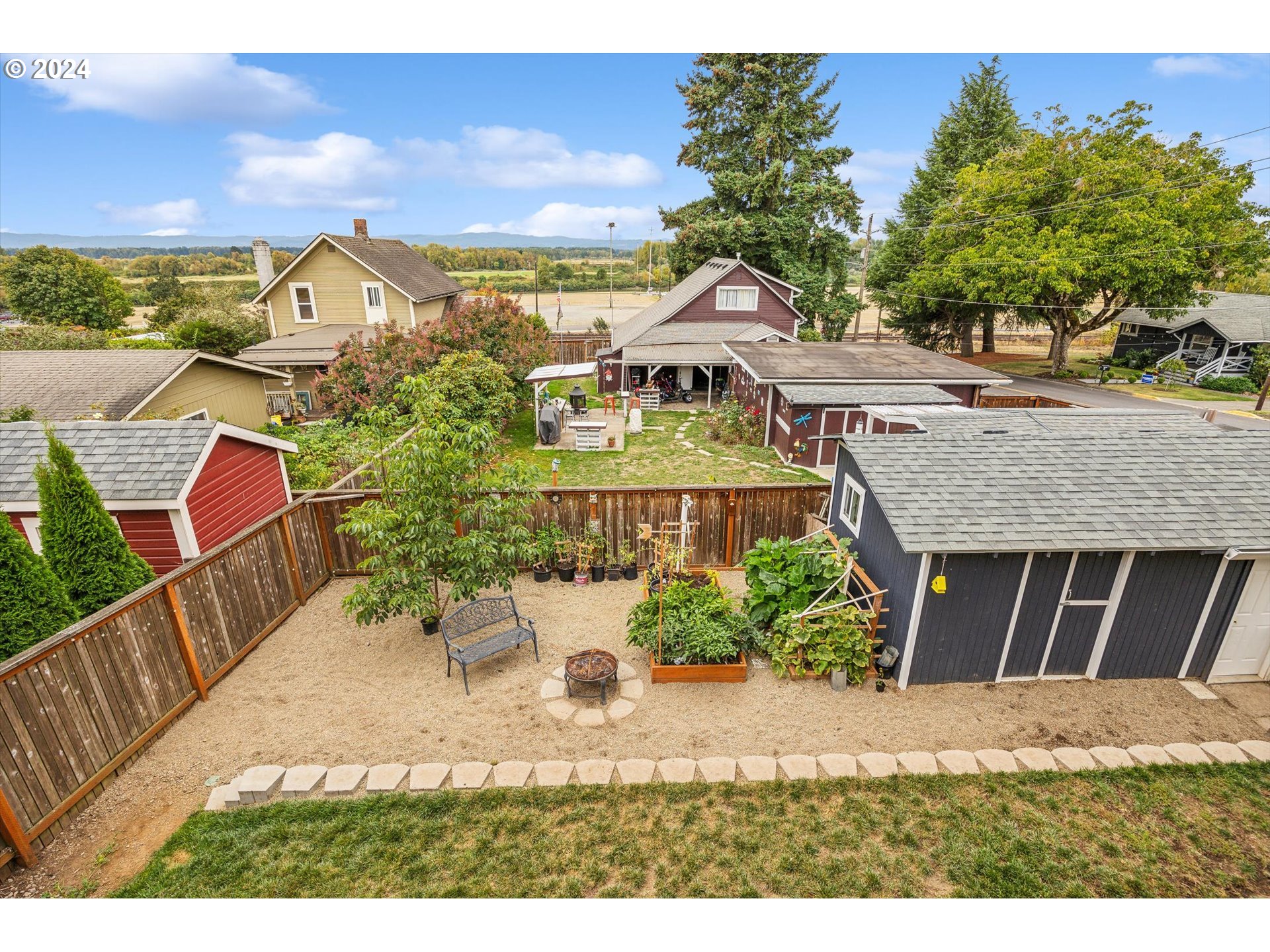 413 North 1st Avenue Ridgefield, WA 98642 - Photo 32 of 36 a view of a house with a outdoor space