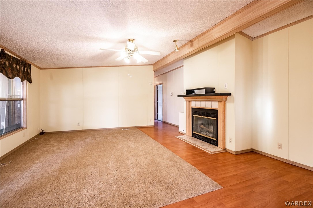 4496 Cowlic Road Golden Valley, AZ 86413 - Photo 6 of 50 a view of a livingroom with a fireplace