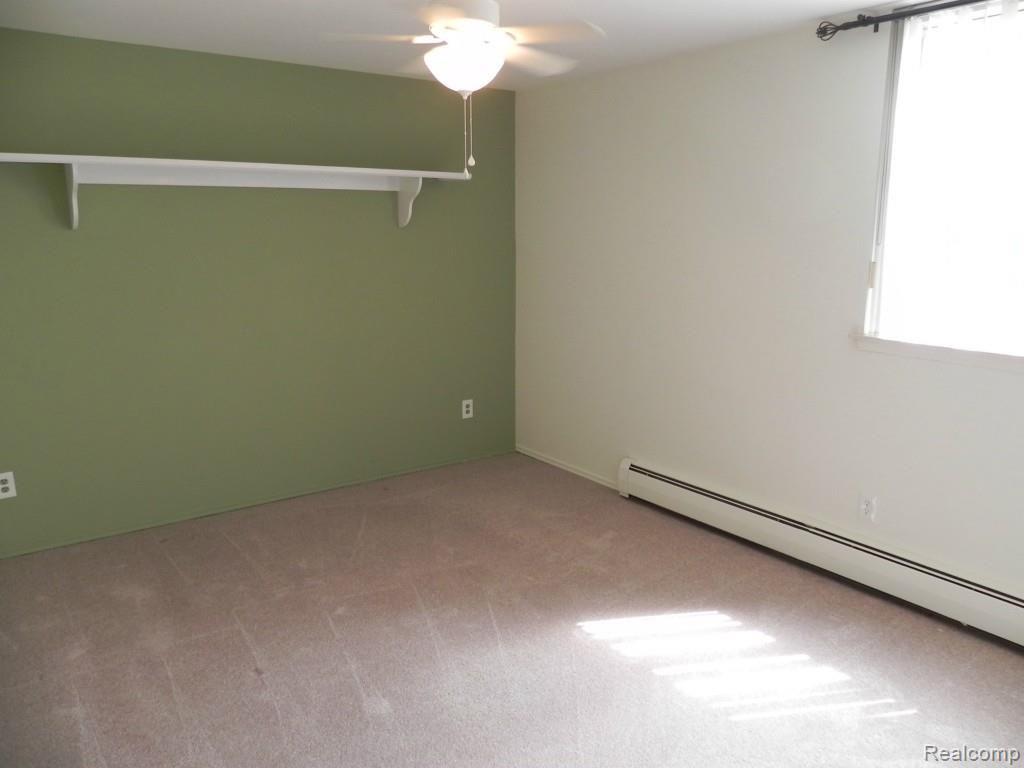 4905 Crooks Road, Unit 66 Royal Oak, MI 48073 - Photo 11 of 19 Master bedroom is large and has a double closet