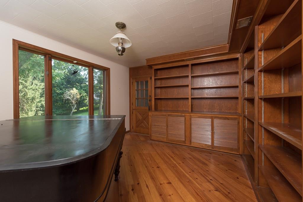 709 Camp Meeting Road Sewickley, PA 15143 - Photo 7 of 18 a view of a room with racks on the wall