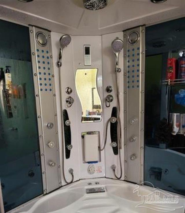 9543 Quiet Creek Road Milton, FL 32570 - Photo 12 of 16 a view of walk in closet