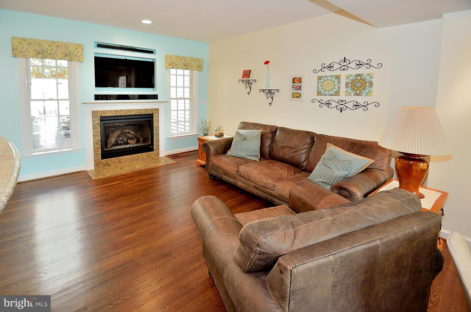 386 Myrtle Place Occoquan, VA 22125 - Photo 10 of 30 Family Room w/Hardwoods & Gas Fireplace!