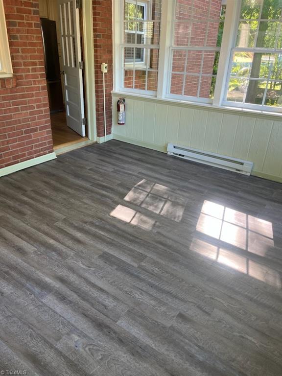 1716 Sandersted Road Southwest Winston-Salem, NC 27103 - Photo 16 of 39 New Floor in Sunroom