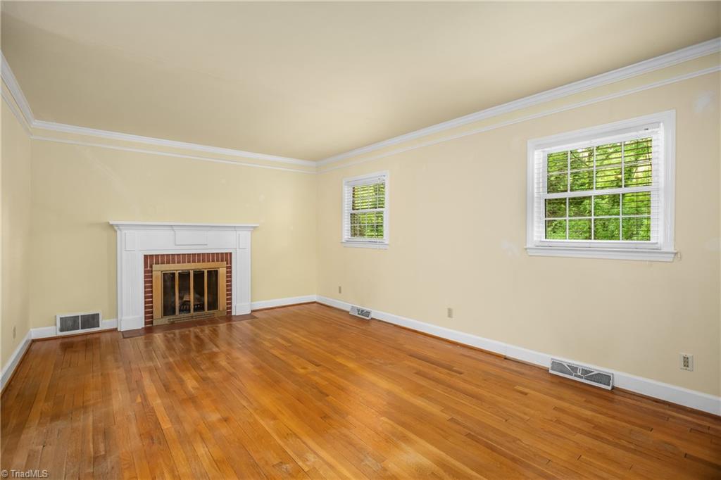1716 Sandersted Road Southwest Winston-Salem, NC 27103 - Photo 4 of 39 Living Room with Wood Burning Fireplace.