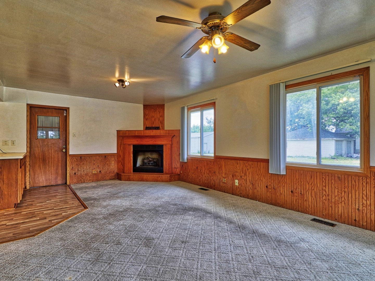 5159 West Margaret Street Monee, IL 60449 - Photo 4 of 13 a view of an empty room with window and fireplace