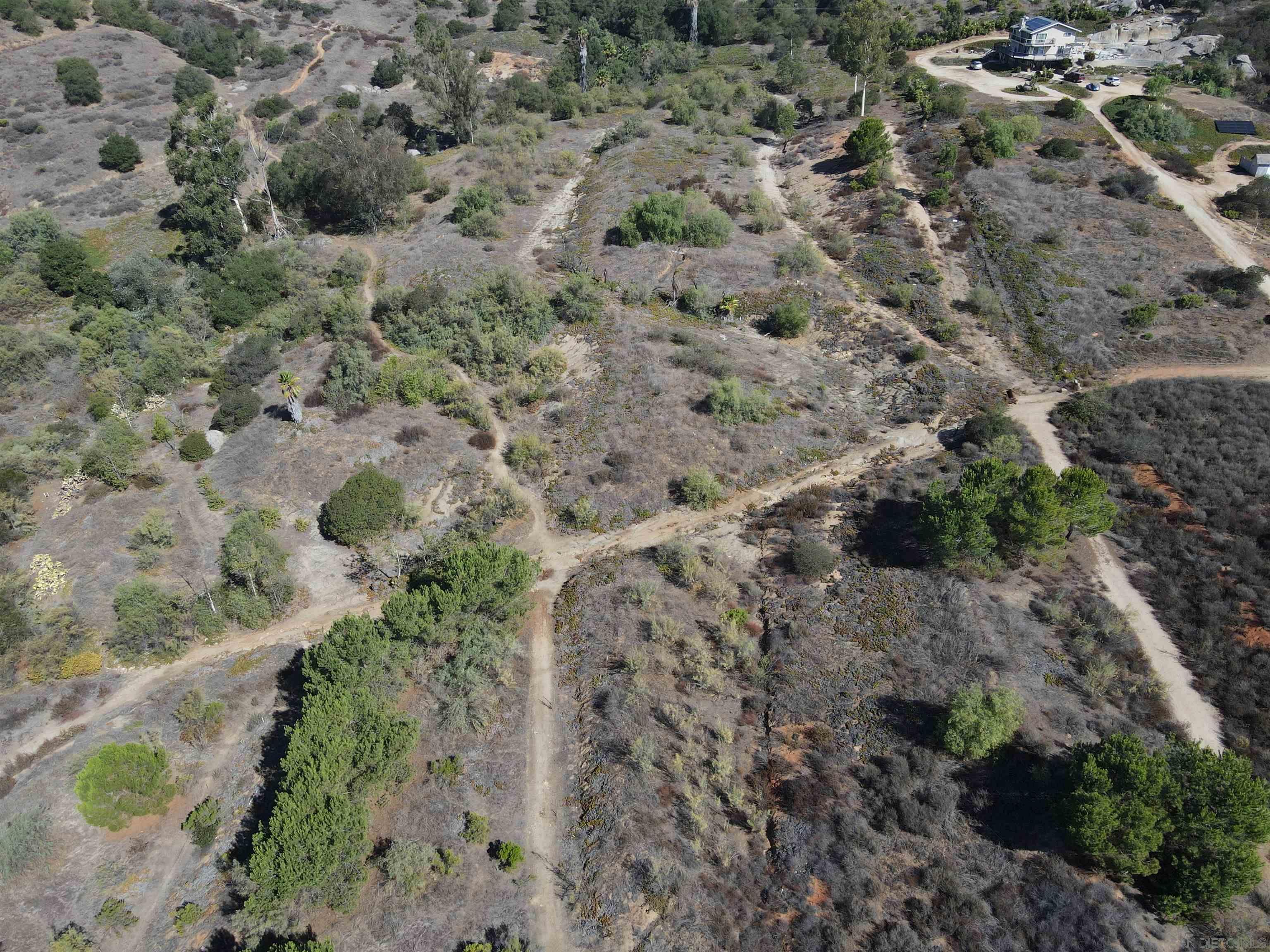 77 Jeffrey Heights Road Valley Center, CA 92082 - Photo 8 of 15 a view of a yard with a yard
