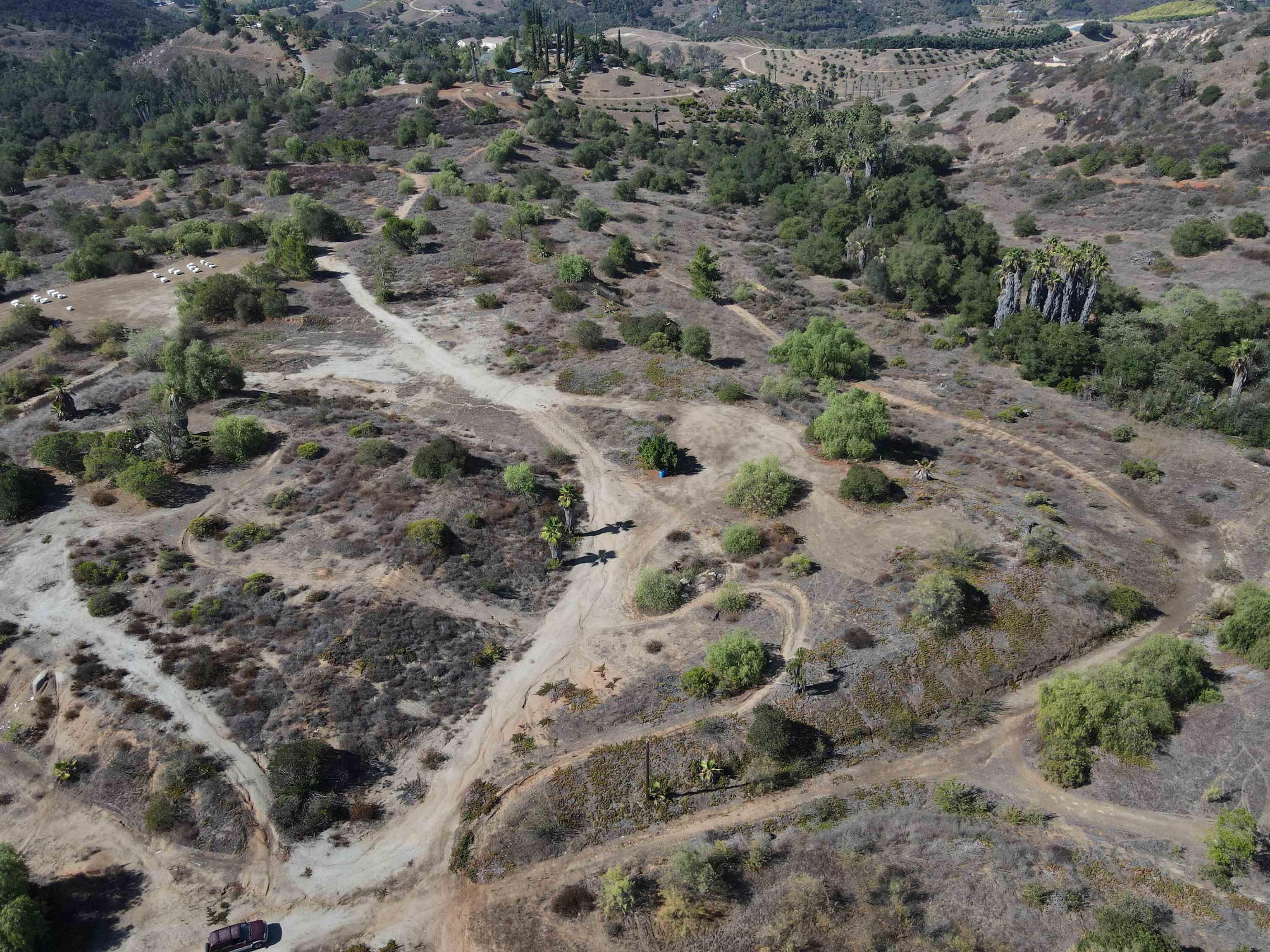 77 Jeffrey Heights Road Valley Center, CA 92082 - Photo 10 of 15 a view of a dry yard with green space