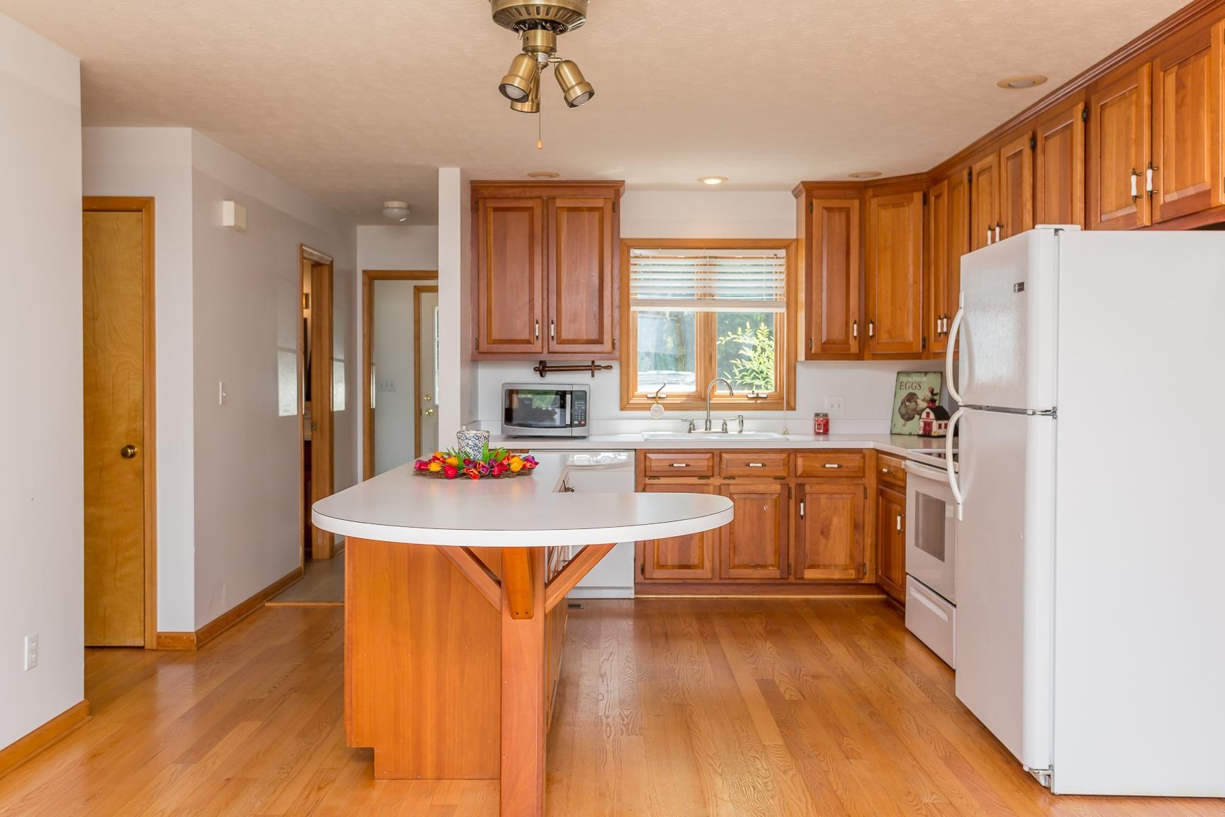 693 Stover Shop Road Churchville, VA 24421 - Photo 11 of 42 a kitchen with refrigerator a sink and a refrigerator