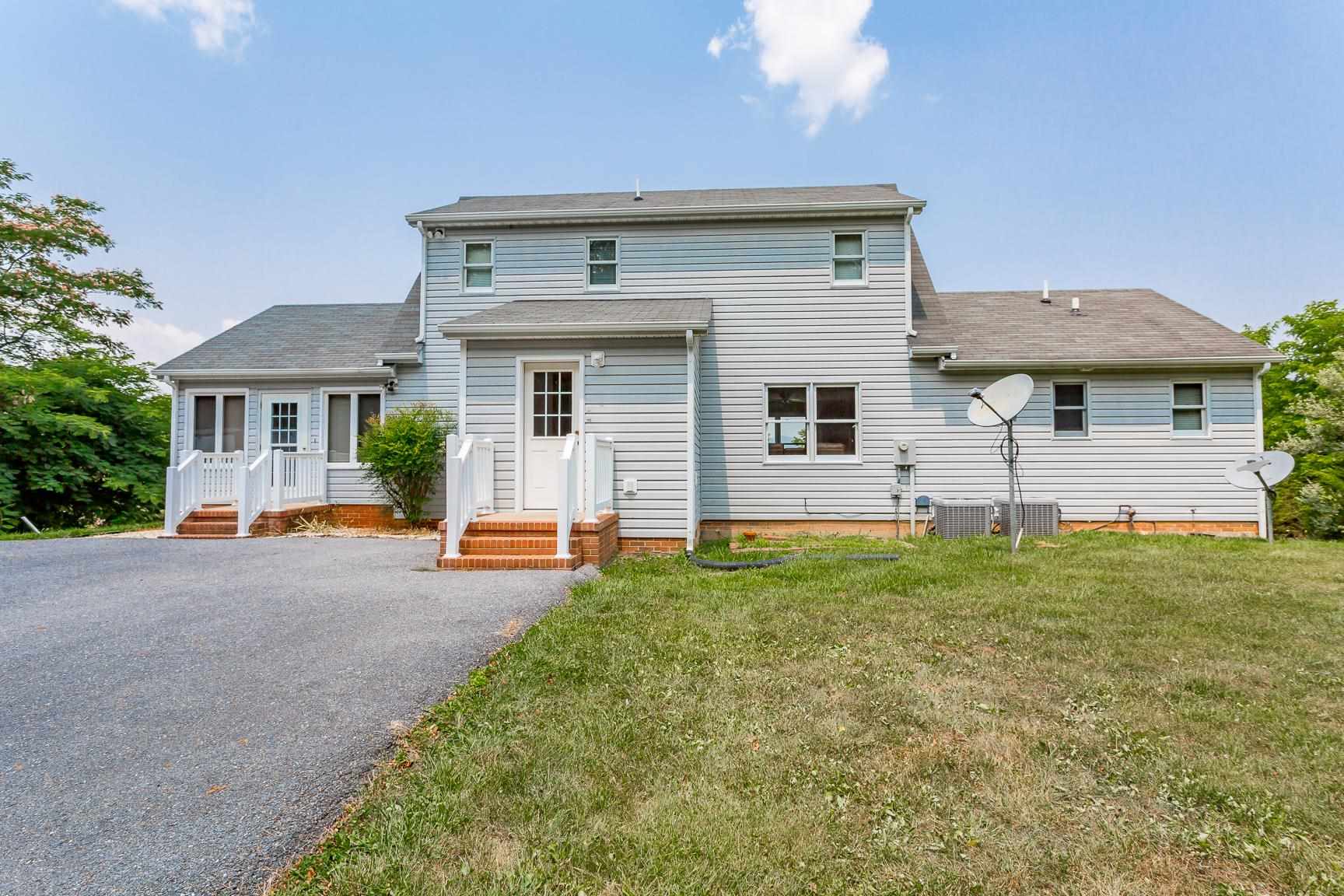 693 Stover Shop Road Churchville, VA 24421 - Photo 33 of 42 a front view of a house with a yard