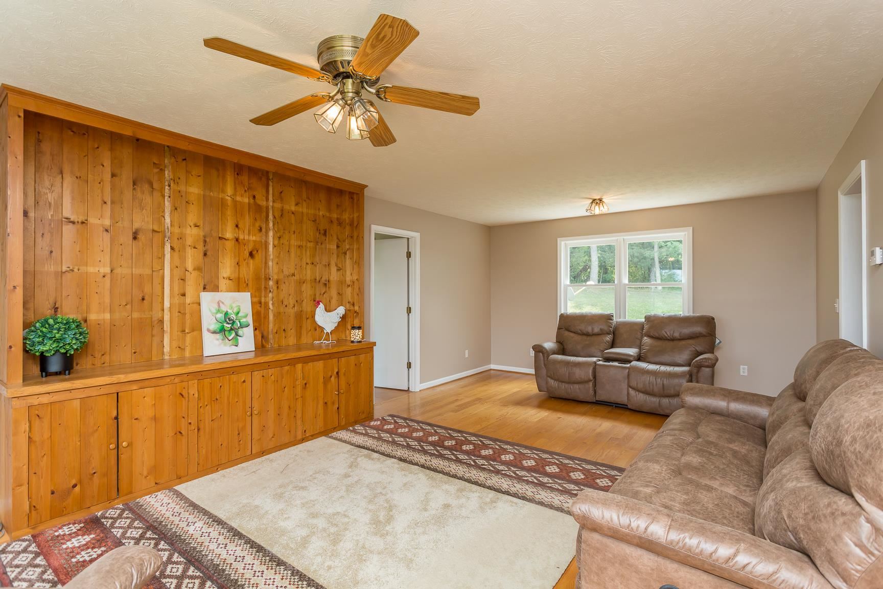 693 Stover Shop Road Churchville, VA 24421 - Photo 4 of 42 a living room with furniture and a window