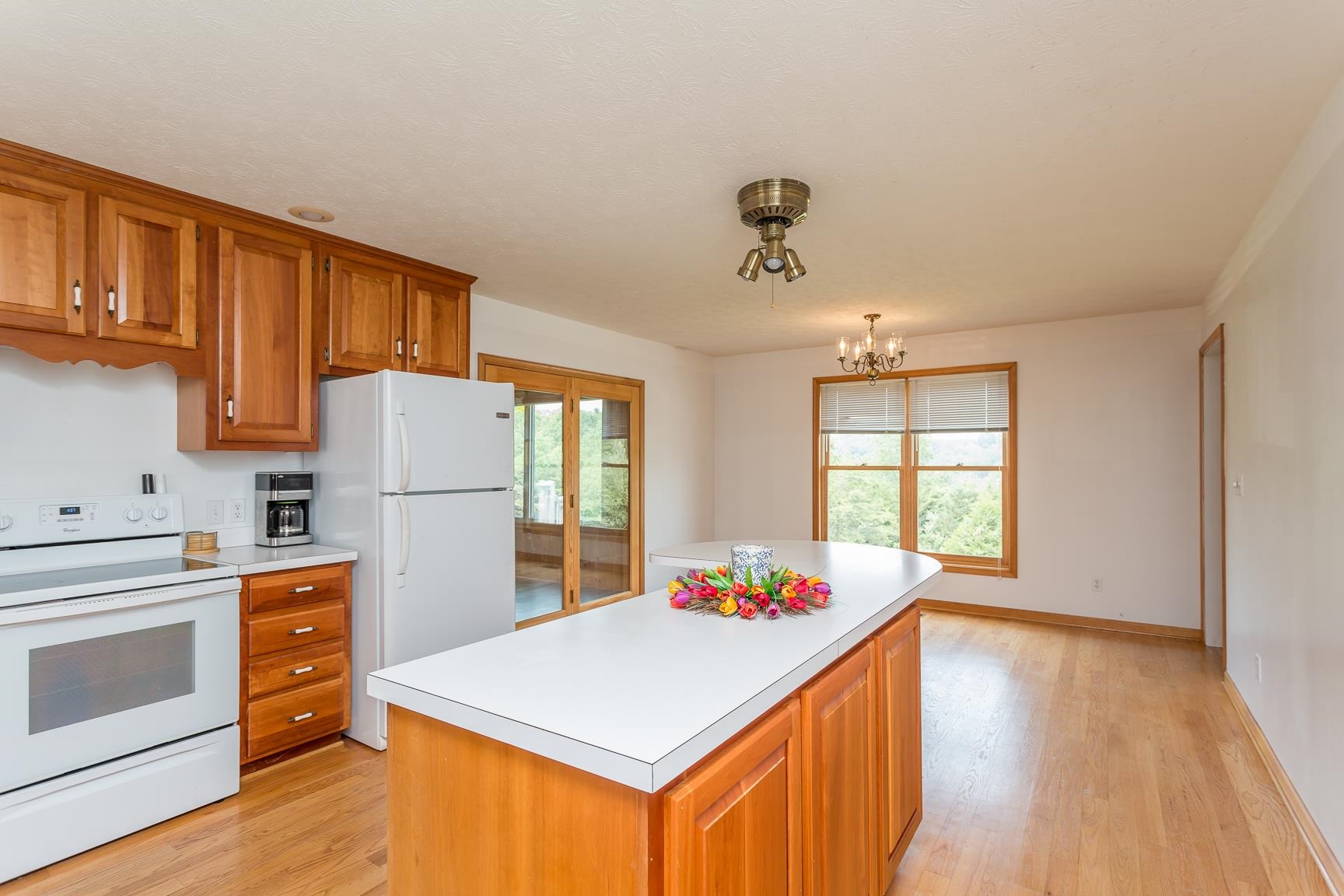 693 Stover Shop Road Churchville, VA 24421 - Photo 10 of 42 a kitchen that has a fridge and a stove in it