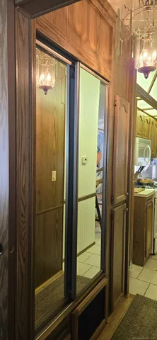 a bathroom with a glass shower door and a sink