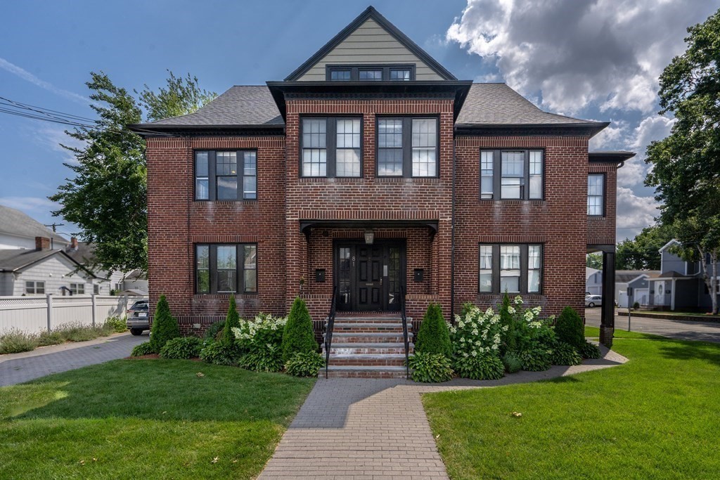 81 Butler Street, Unit 2 Revere, MA 02151 - Photo 1 of 1 a front view of a house with garden
