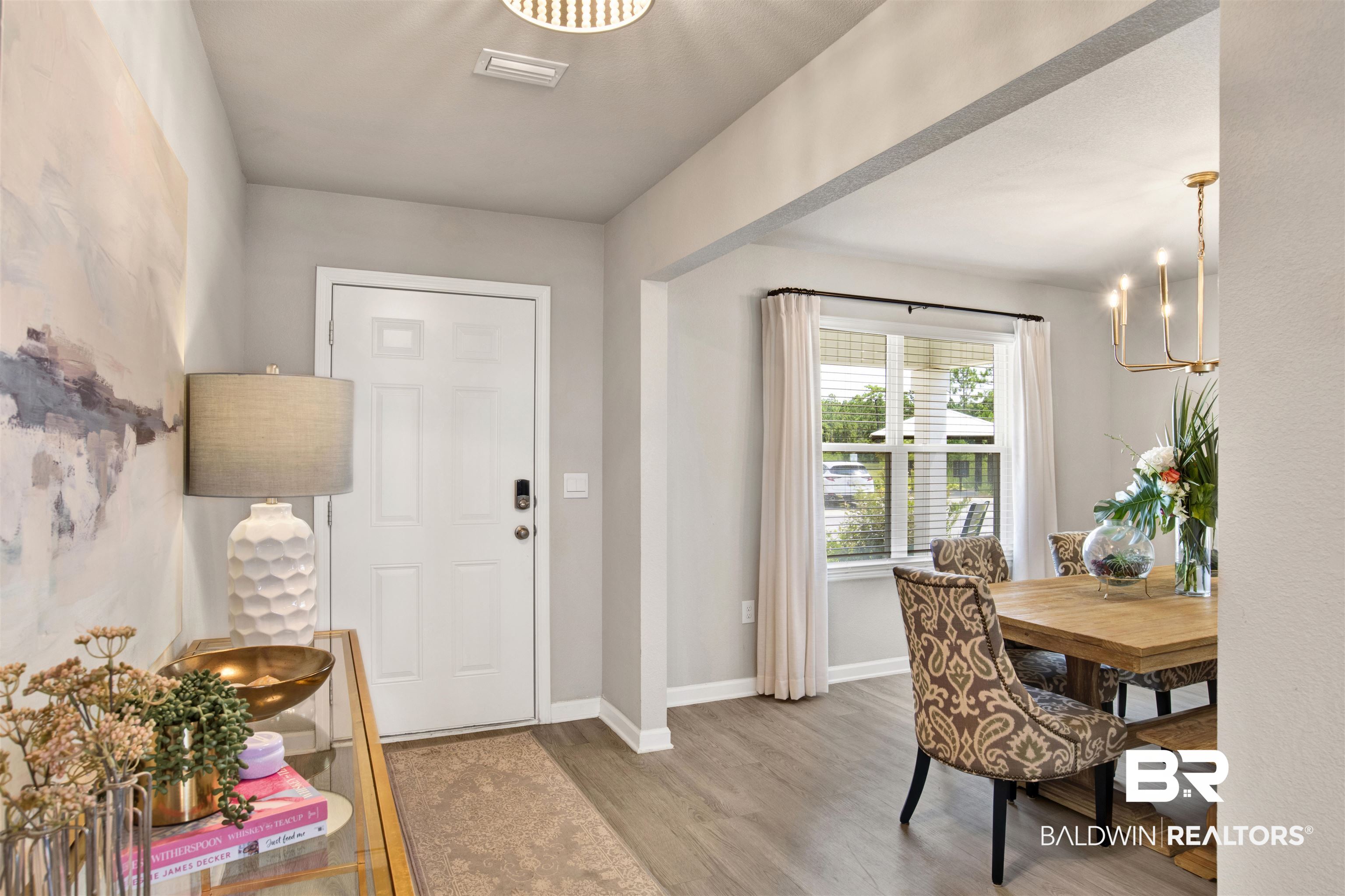 24532 Broken Sound Loop Orange Beach, AL 36561 - Photo 5 of 29 Foyer entrance featuring hardwood / wood-style floors