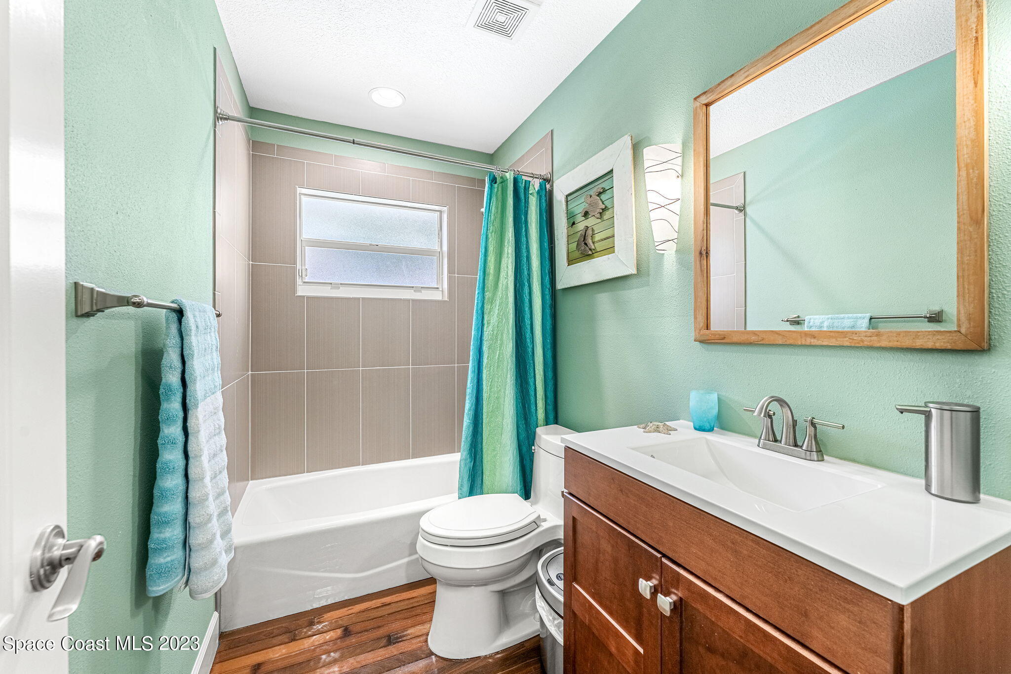 425 Cinnamon Drive Satellite Beach, FL 32937 - Photo 33 of 55 a bathroom with a sink a toilet and shower