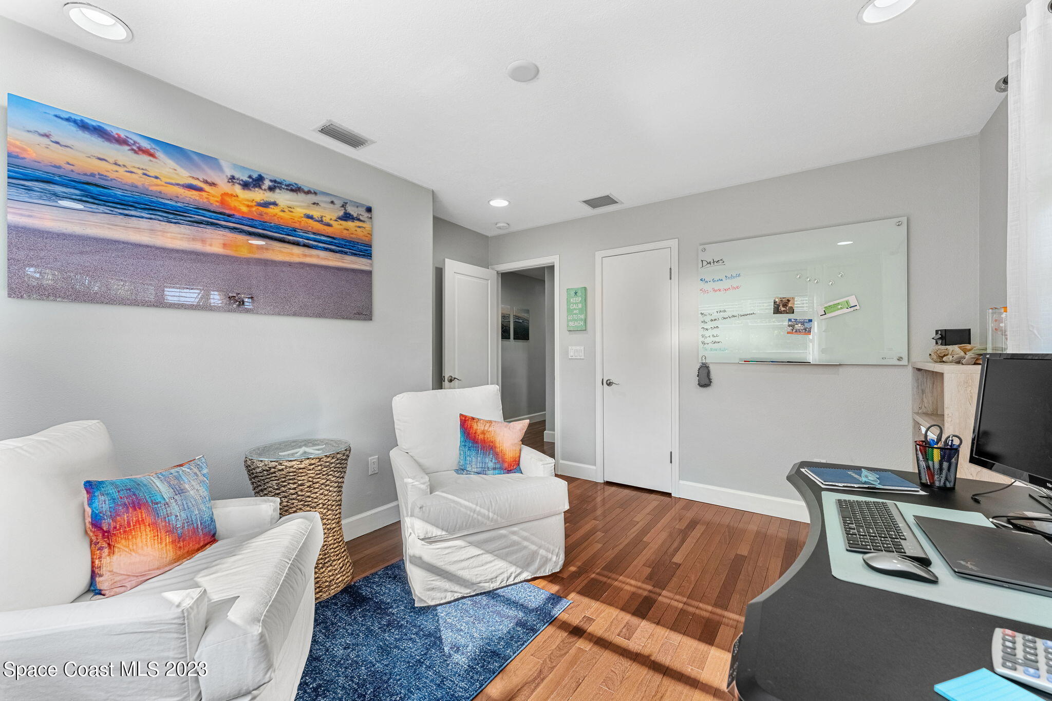 425 Cinnamon Drive Satellite Beach, FL 32937 - Photo 35 of 55 a living room with furniture and a flat screen tv