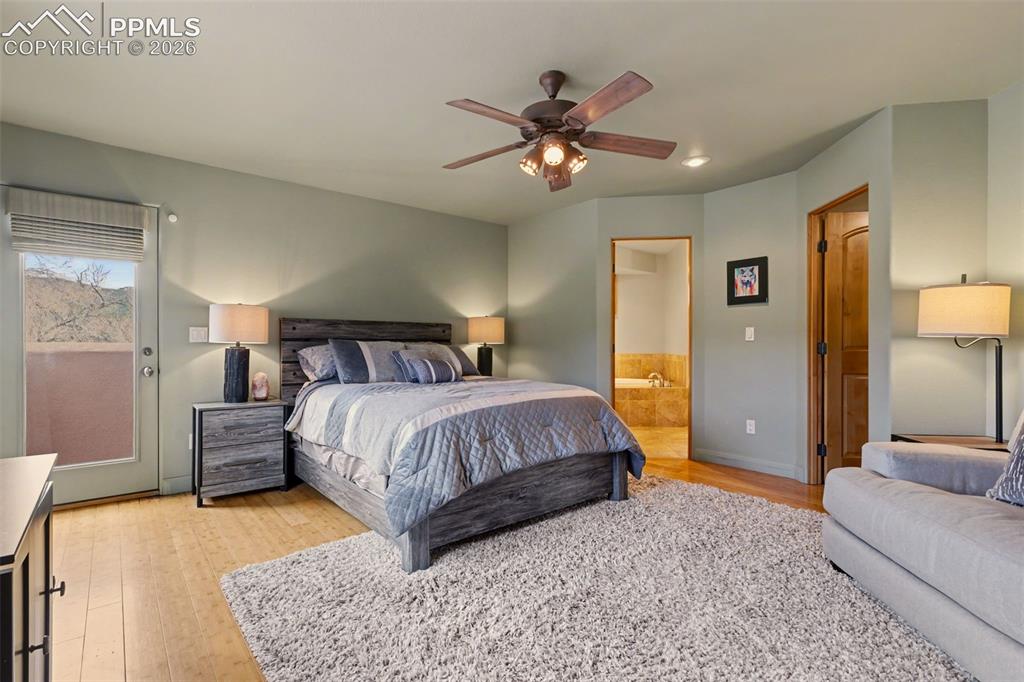 21 Crystal Park Road Manitou Springs, CO 80829 - Photo 11 of 27 Primary suite with attached 5 piece bathroom, walk-in closet.