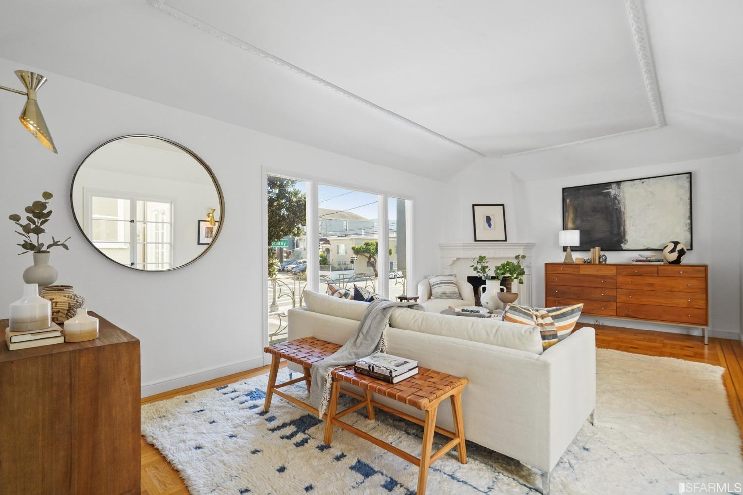 2290 Alemany Boulevard San Francisco, CA 94112 - Photo 12 of 45 a living room with furniture a mirror and a flat screen tv