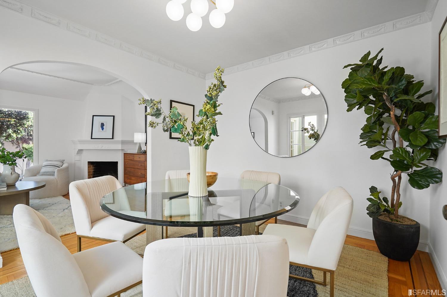 2290 Alemany Boulevard San Francisco, CA 94112 - Photo 21 of 45 a dining room with furniture a potted plant and a mirror
