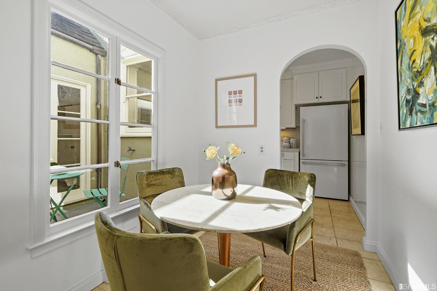 2290 Alemany Boulevard San Francisco, CA 94112 - Photo 22 of 45 a view of a dining room with furniture and a window