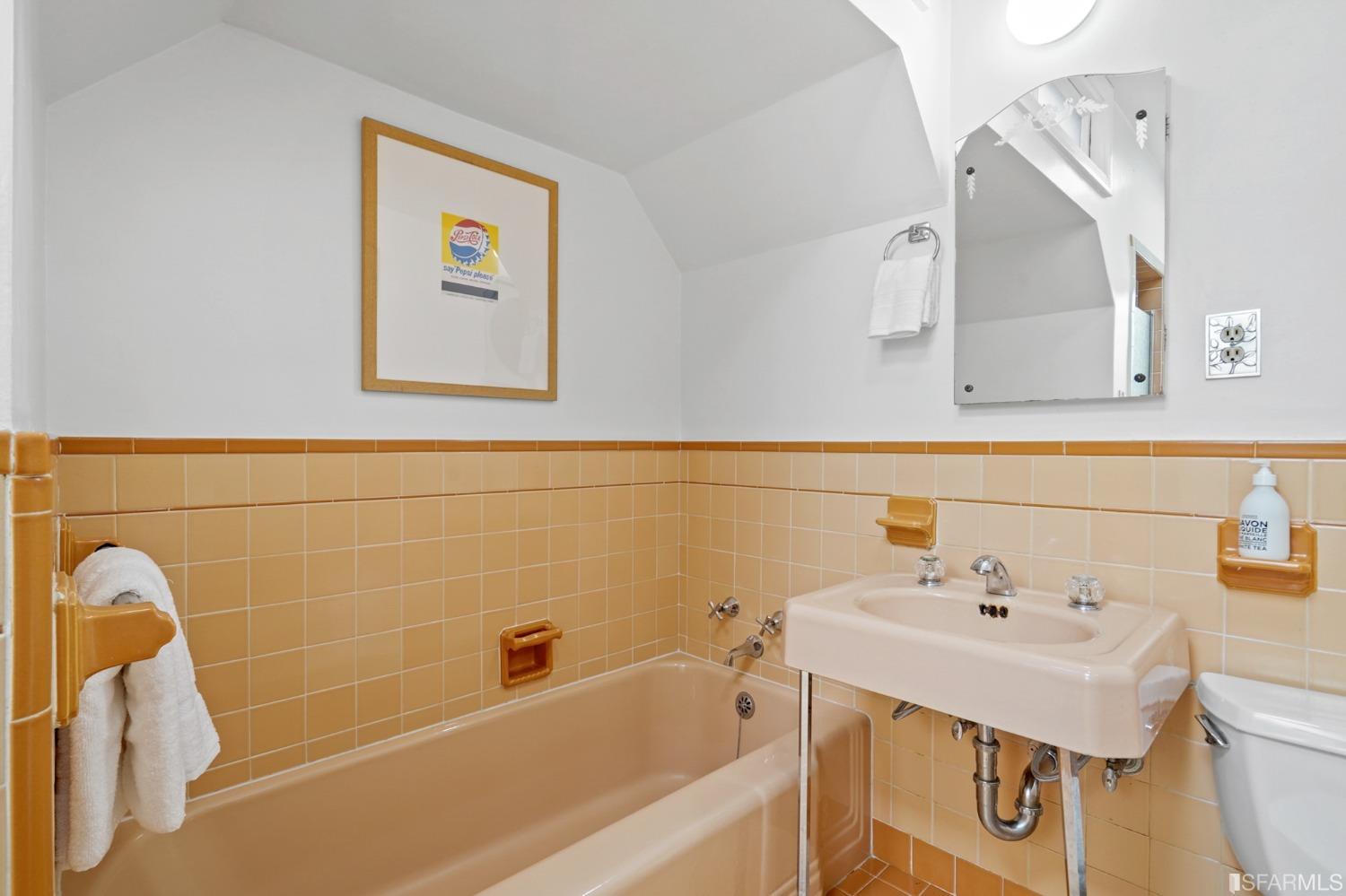 2290 Alemany Boulevard San Francisco, CA 94112 - Photo 29 of 45 a bathroom with a bathtub and a sink