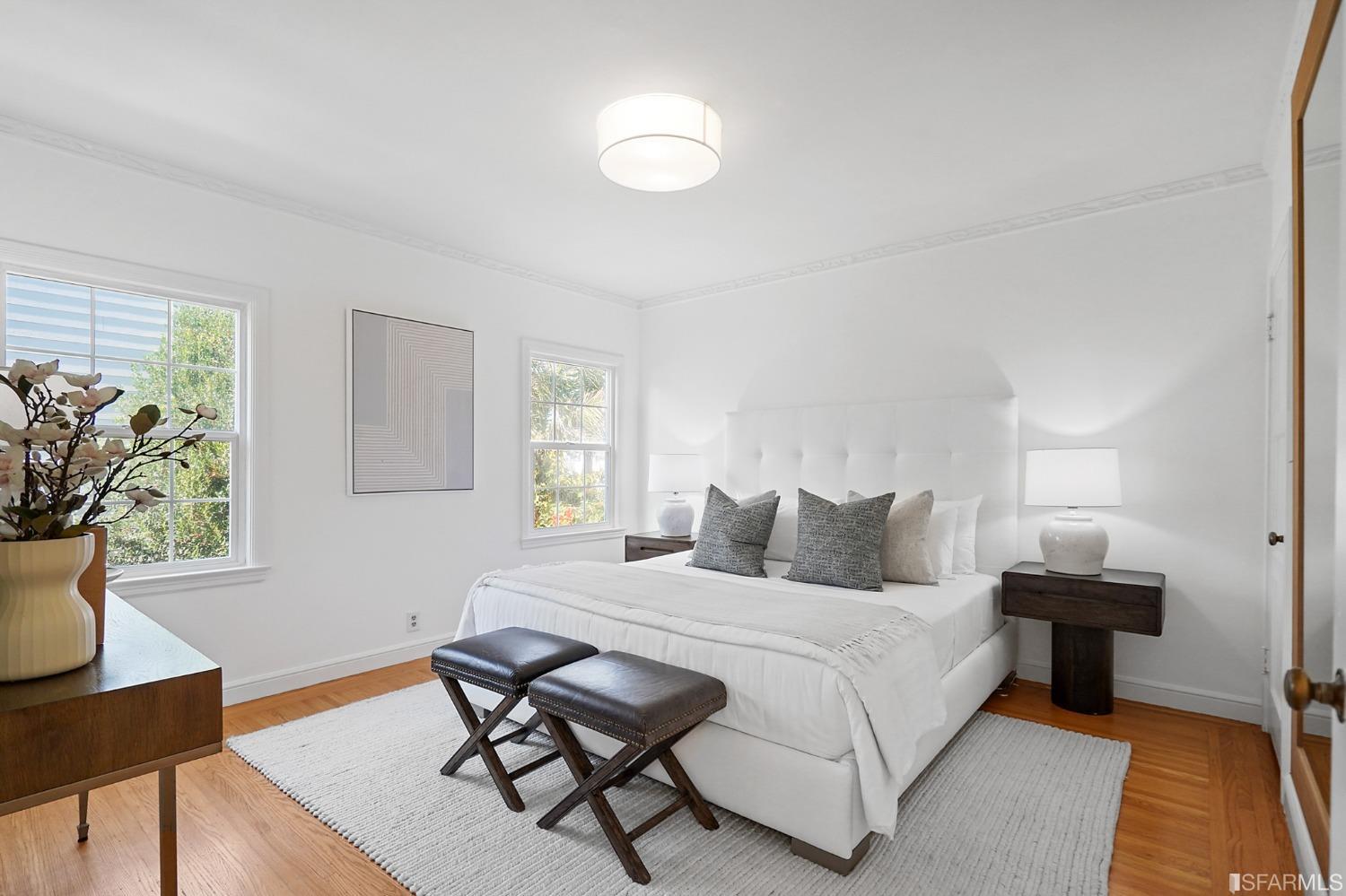 2290 Alemany Boulevard San Francisco, CA 94112 - Photo 32 of 45 a bedroom with a bed and a potted plant on table