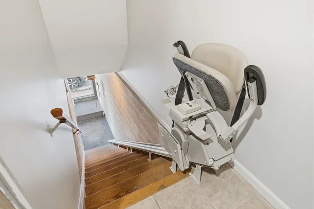 a view of a garden with iron fence